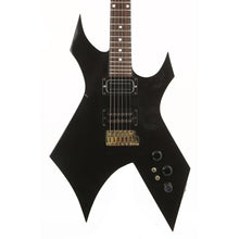 B.C. Rich USA Warlock Black with White Binding