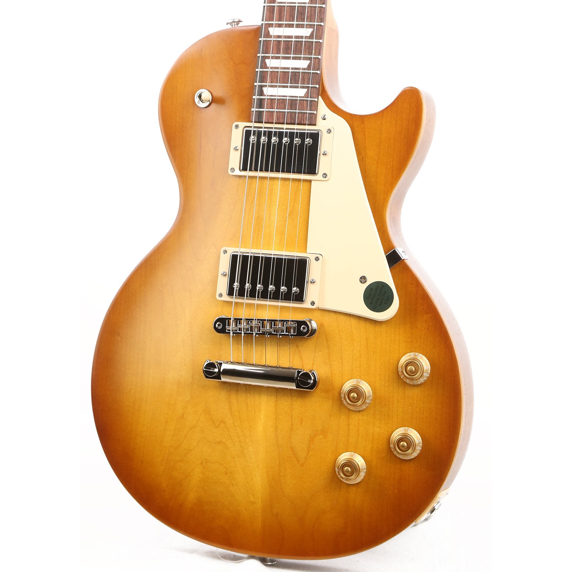 Gibson Les Paul TRIBUTE honeyBurst￼￼ Gibson Les Paul Tribute Satin Honeyburst Used | The Music Zoo